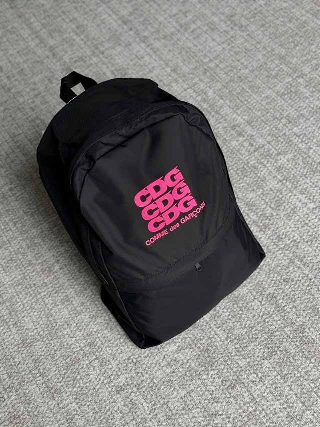 Comme des Garçons Comme des Garçons CDG Black Pink Logo Nylon Backpack - Buy on Kakobuysheetfind
