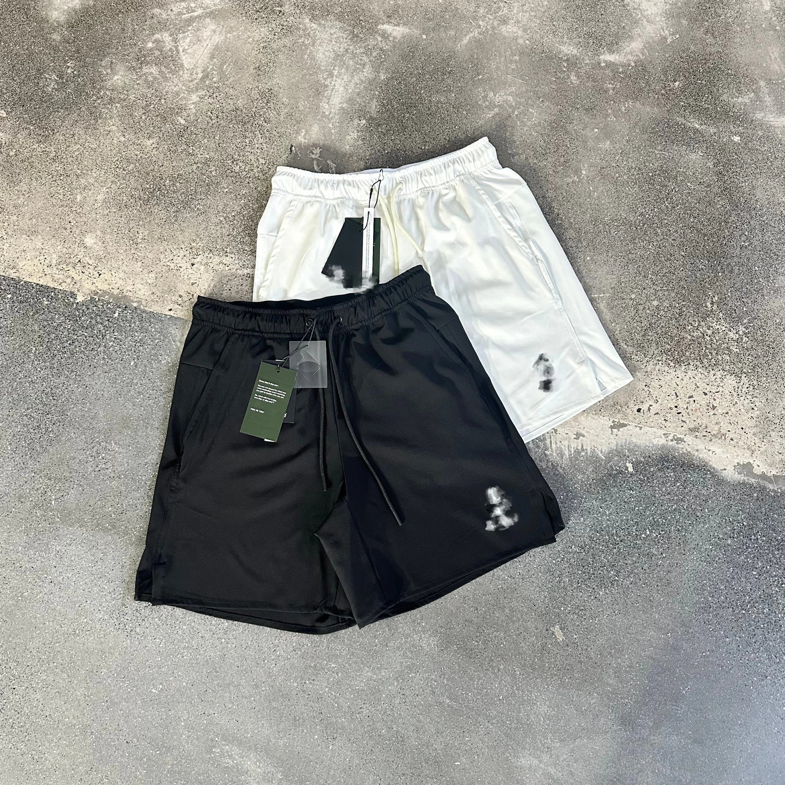 Black And White Drawstring Waist Shorts With Abstract Print