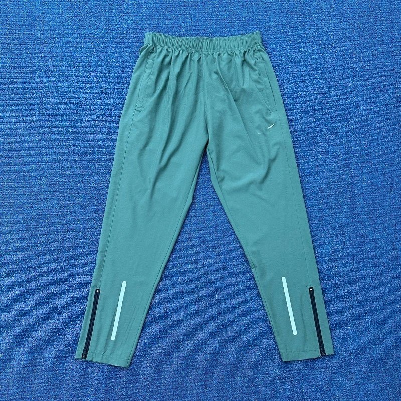 Nike Trousers Lightweight zip-ankle track image 9