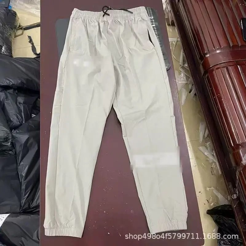 Nike Trousers Lightweight zip-ankle track — nk white quick-dry