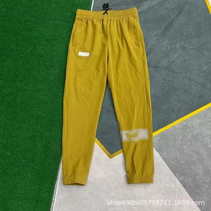 Nike Trousers Lightweight zip-ankle track — nk yellow quick-drying