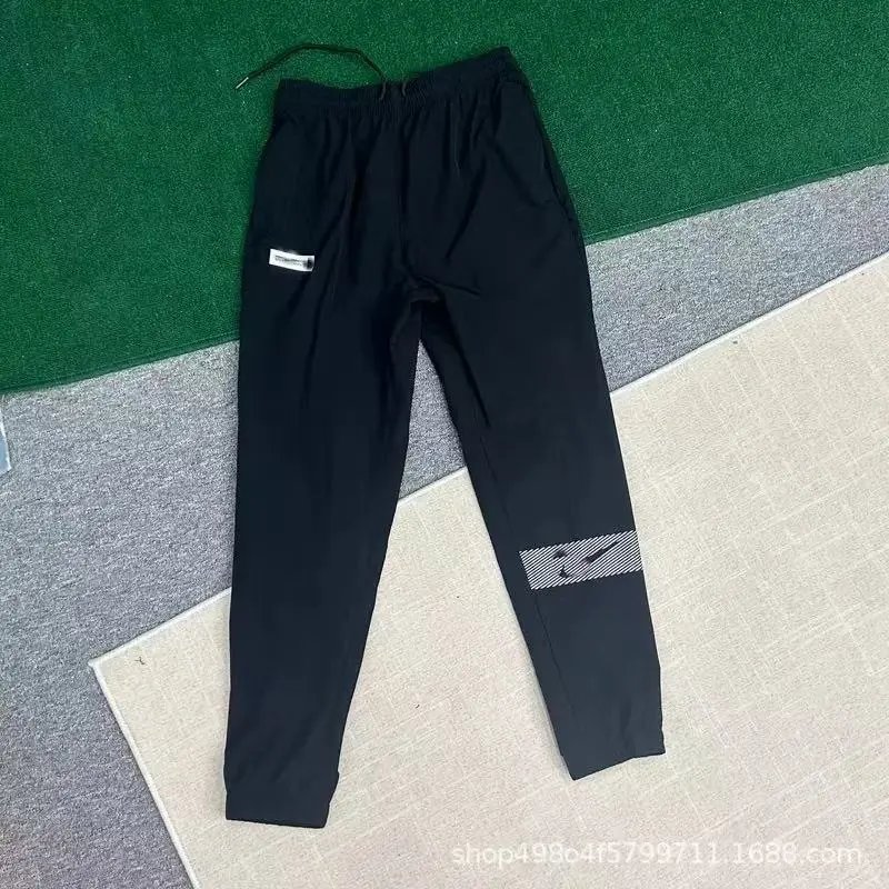 Nike Trousers Lightweight zip-ankle track — nk black quick-dry