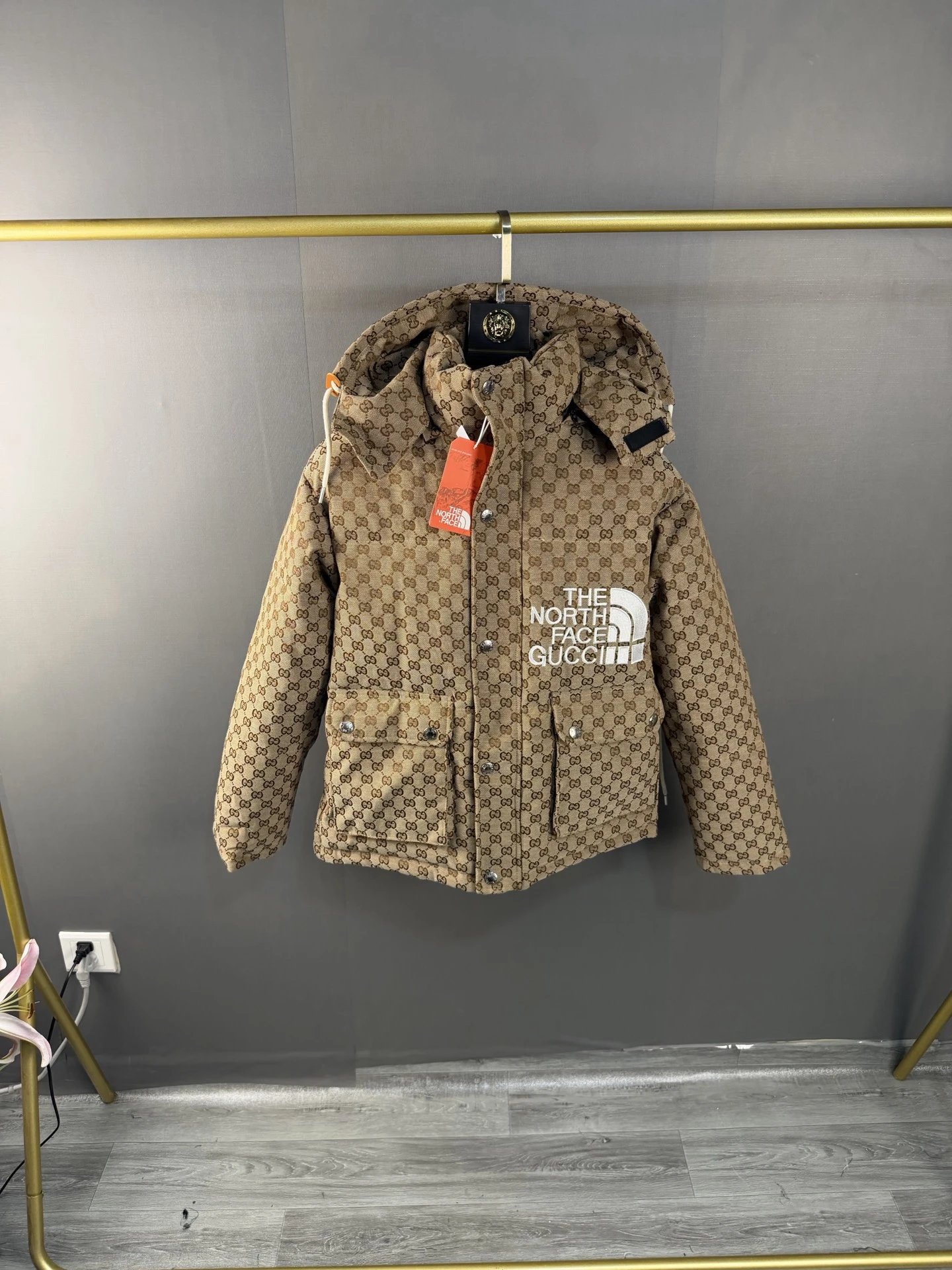 The North Face Down Jackets Hooded quilted puffer — 11