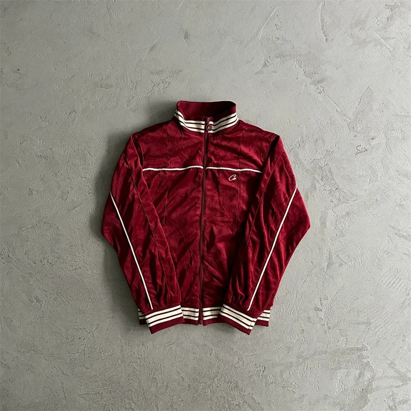 Corteiz’s velvet stand-collar track jacket—often referred to as "Alcatraz"—is an iconic piece from the British streetwear brand, a style made famous by rappers such as Central Cee.