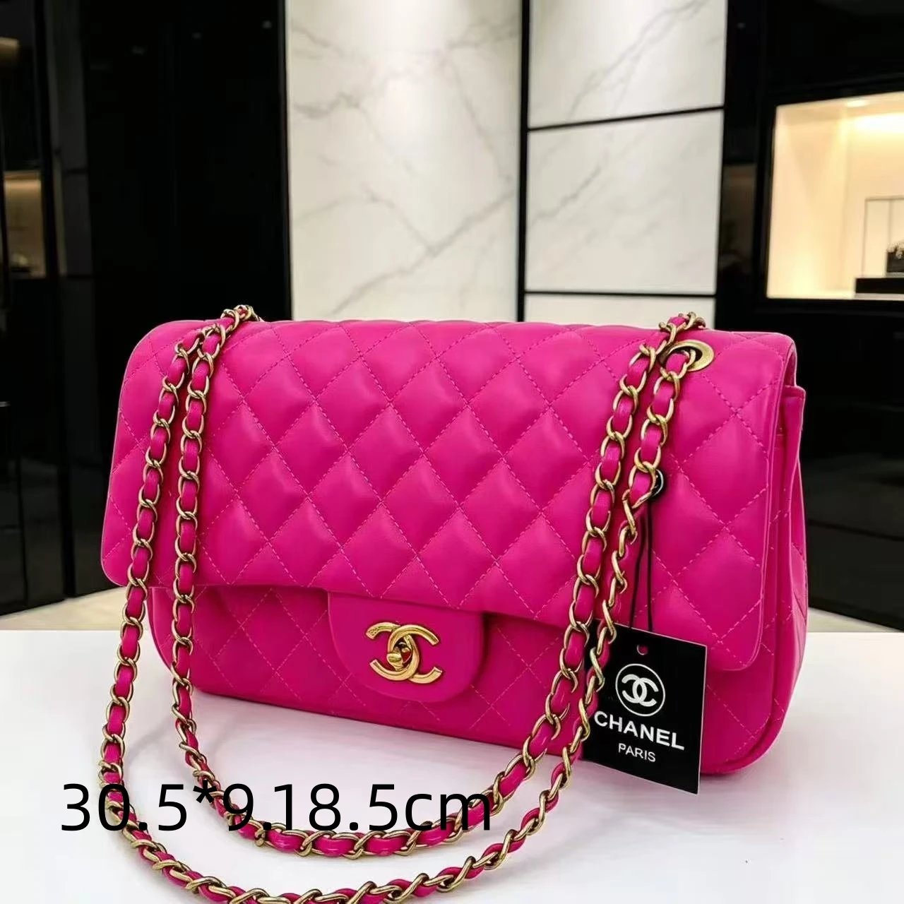 Chanel Shoulder Bags Quilted flap chain bag with interlocking CC turn-lock — 20