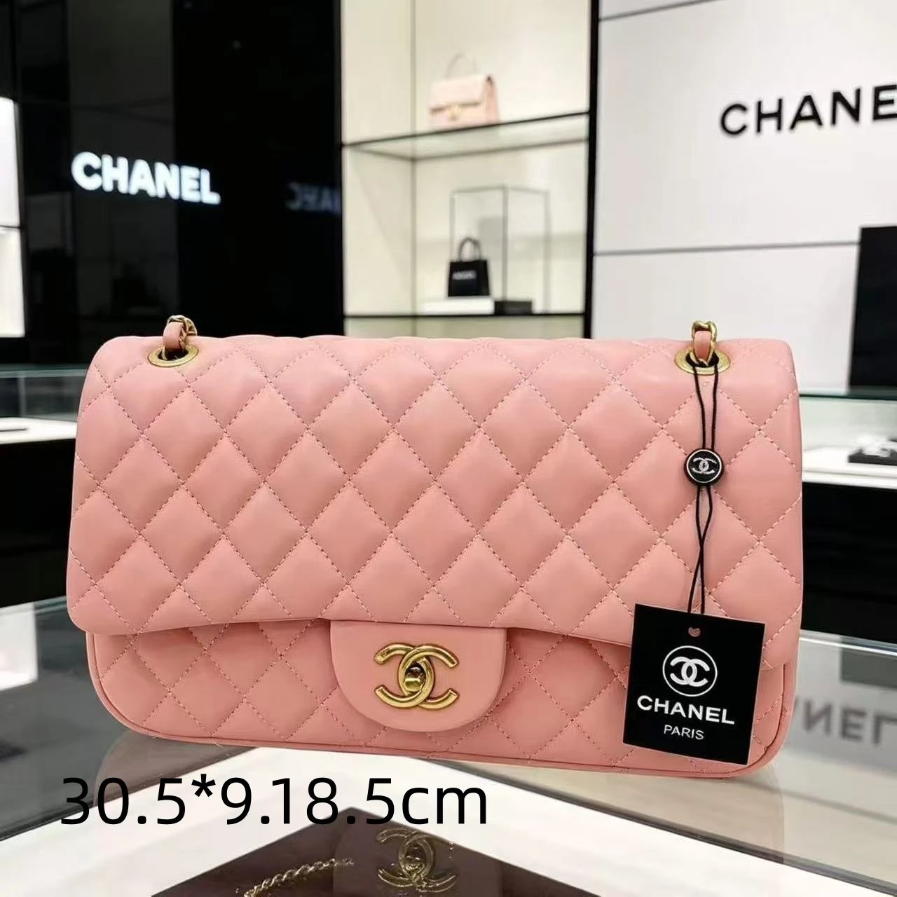 Chanel Shoulder Bags Quilted flap chain bag with interlocking CC turn-lock — 24