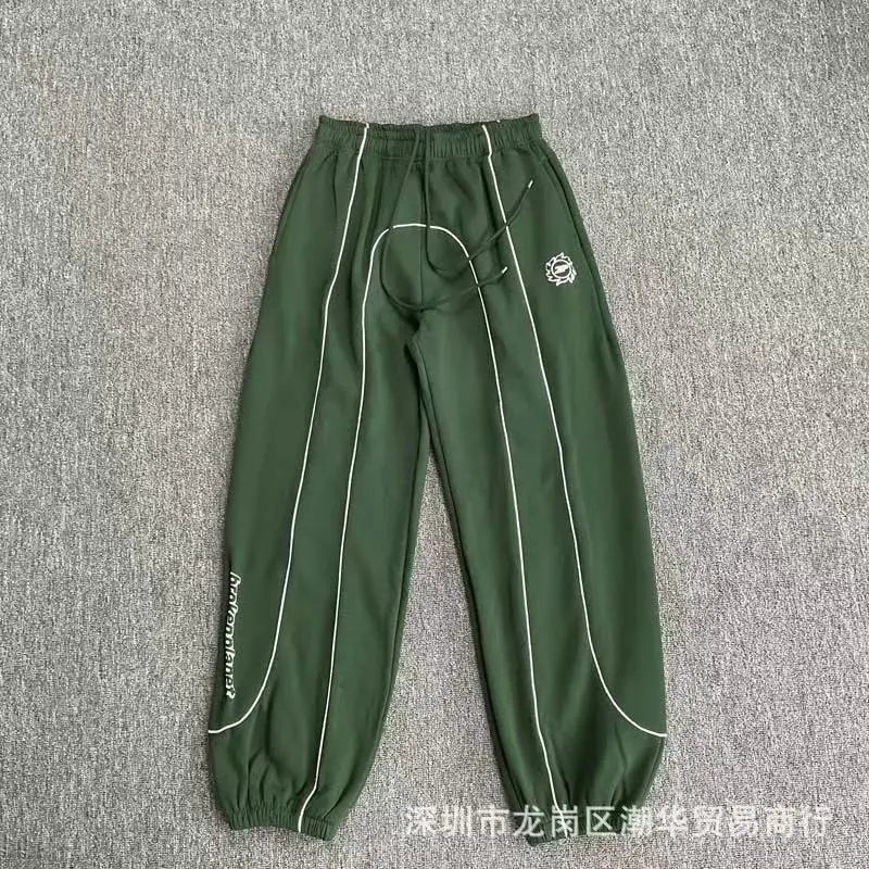 Balenciaga Trousers Wide-leg drawstring sweatpants with side stripes — 30