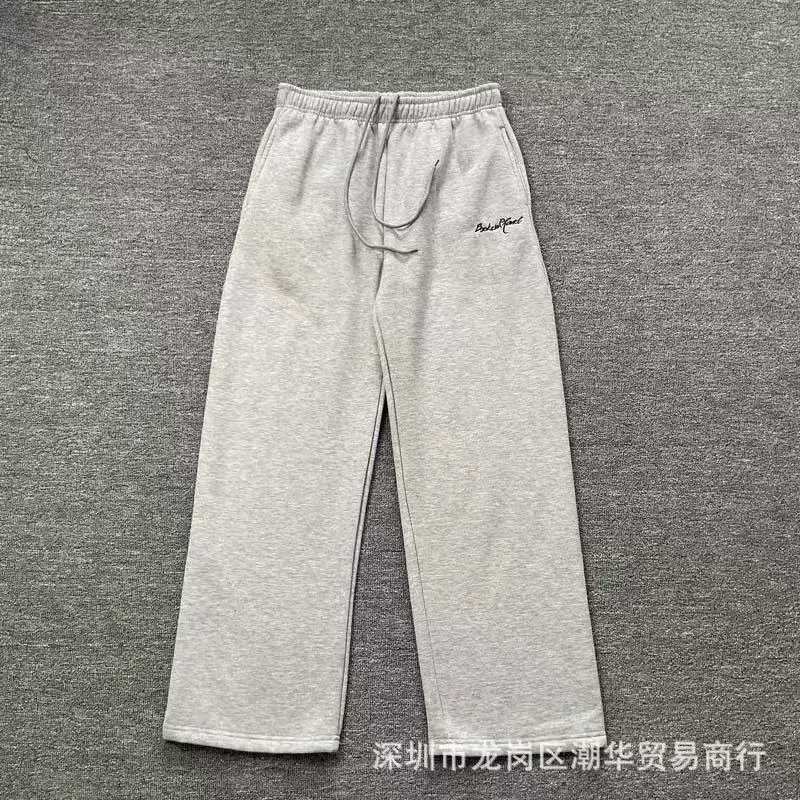 Balenciaga Trousers Wide-leg drawstring sweatpants with side stripes — 27