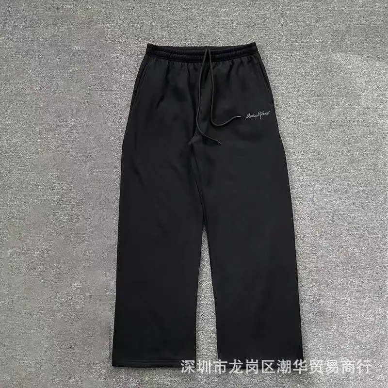 Balenciaga Trousers Wide-leg drawstring sweatpants with side stripes — 25