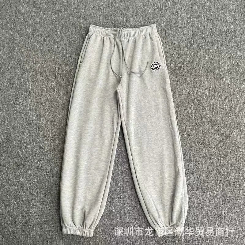 Balenciaga Trousers Wide-leg drawstring sweatpants with side stripes — 19