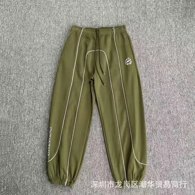 Balenciaga Trousers Wide-leg drawstring sweatpants with side stripes — 31