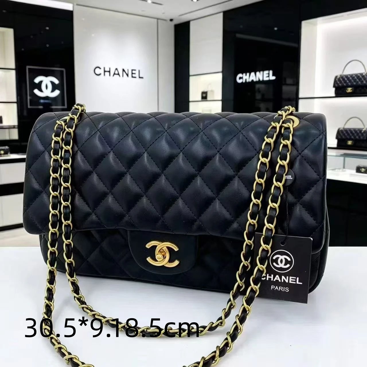 Chanel Shoulder Bags Quilted flap chain bag with interlocking CC turn-lock — 21