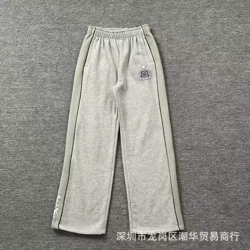 Balenciaga Trousers Wide-leg drawstring sweatpants with side stripes — 18