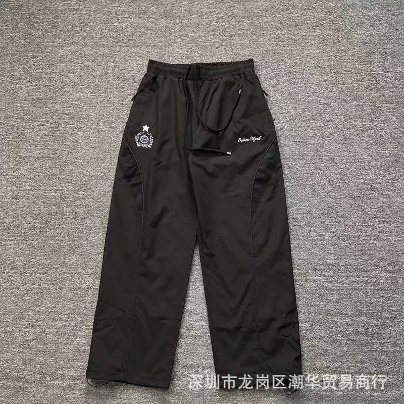 Balenciaga Trousers Wide-leg drawstring sweatpants with side stripes — 20