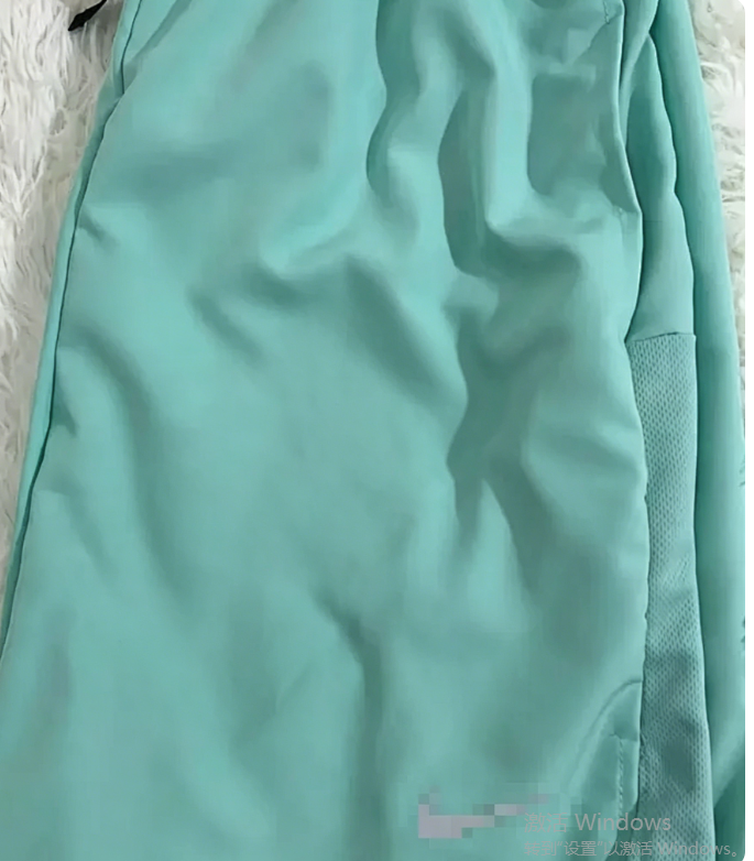 Nike Mixed sportswear apparel — Teal shorts