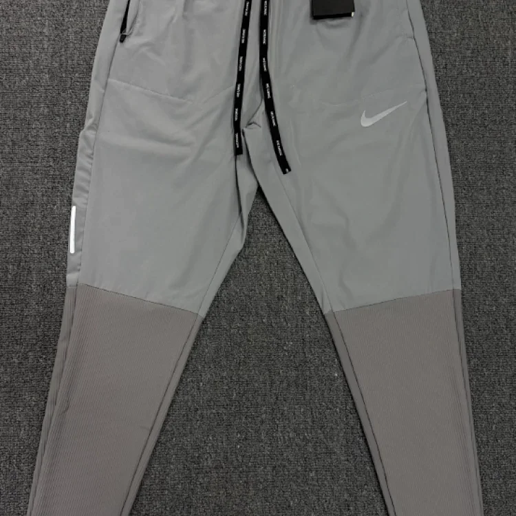 Nike Mixed sportswear apparel — Gray pants