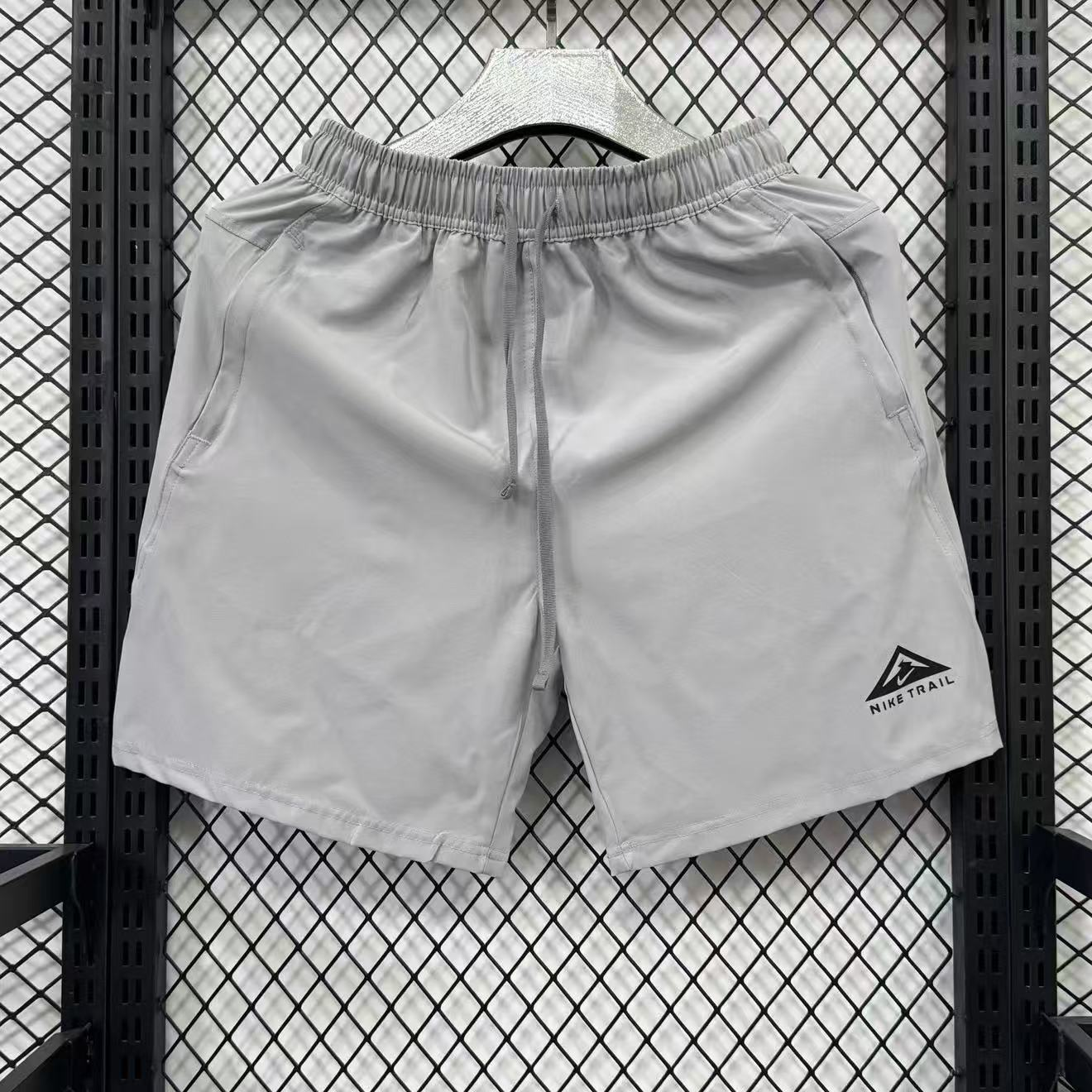 Nike Mixed sportswear apparel — Mountain Peak Shorts (Gray)