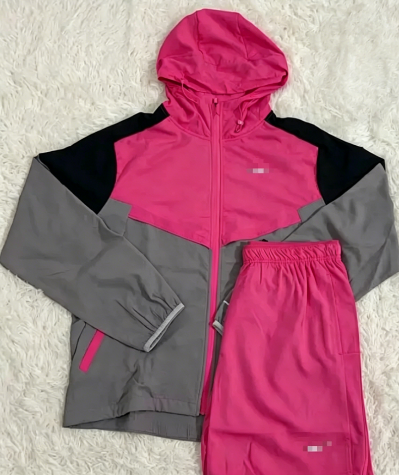Nike Mixed sportswear apparel — Pink jacket pink shorts