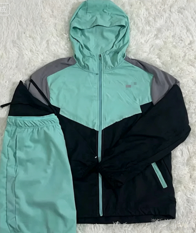 Nike Mixed sportswear apparel — Teal jacket, teal shorts