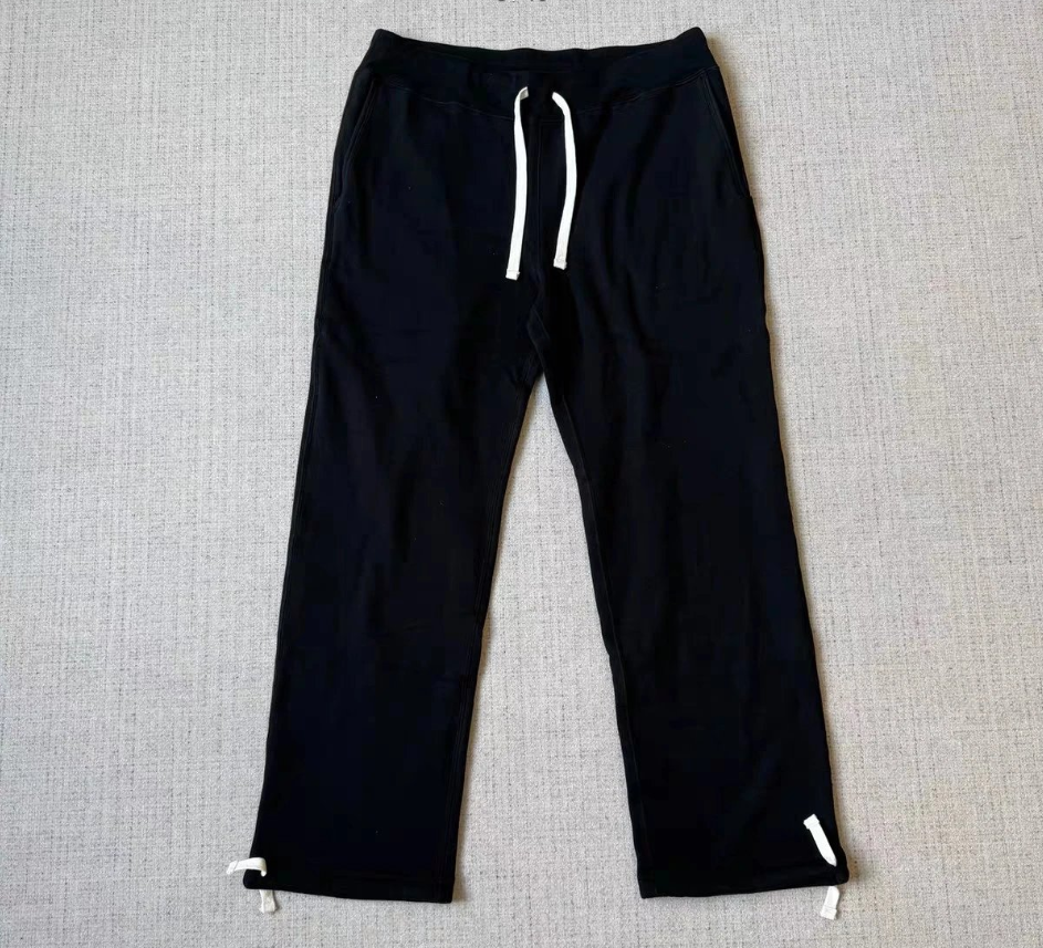 Black Pants with White Label