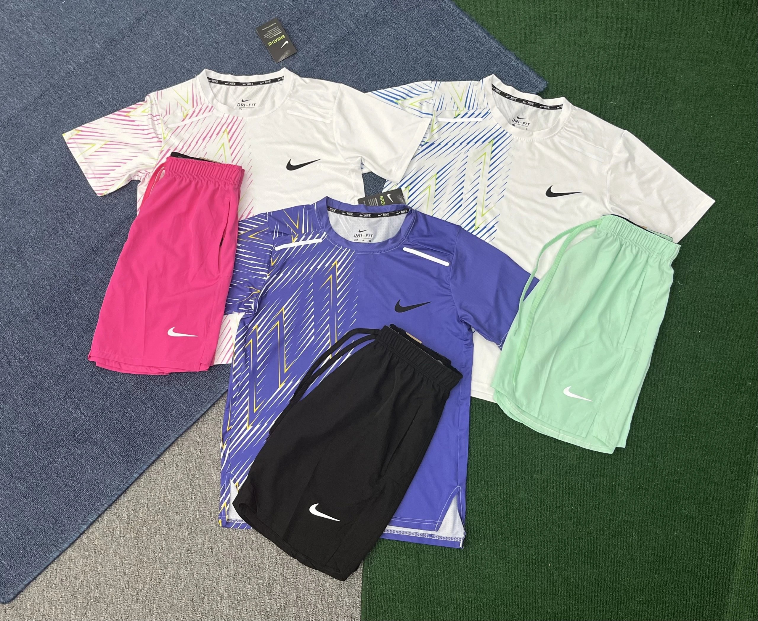 Nike Tracksuits Dri-FIT short-sleeve top and shorts set image 2