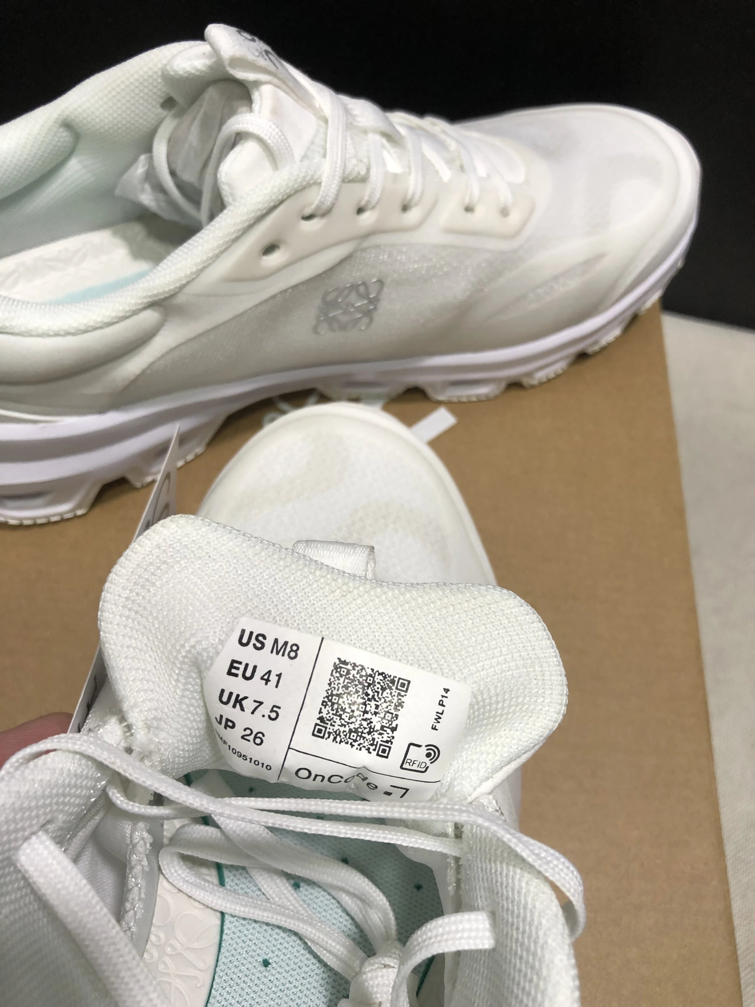 Loewe Two distinct sneaker designs with Anagram branding — 27