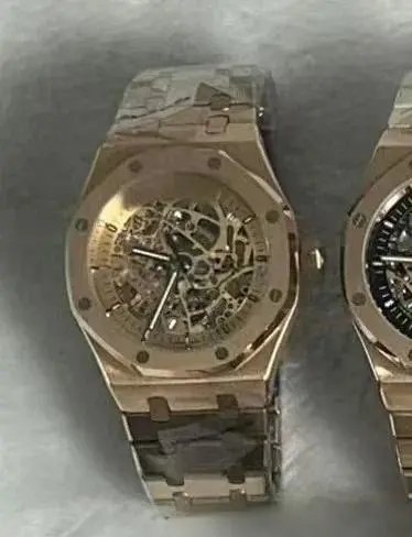Audemars Piguet Watches Royal Oak automatic watch with octagonal bezel and integrated bracelet — Rose-gold golden face