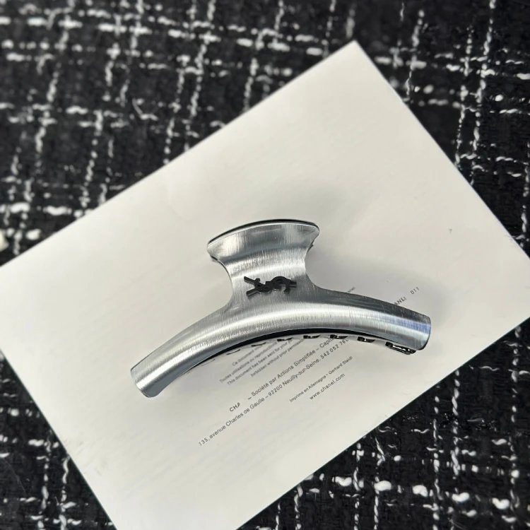 Saint Laurent Uncategorized Metal claw hair clip with YSL monogram — SKU-03-Hanger silver grip clip