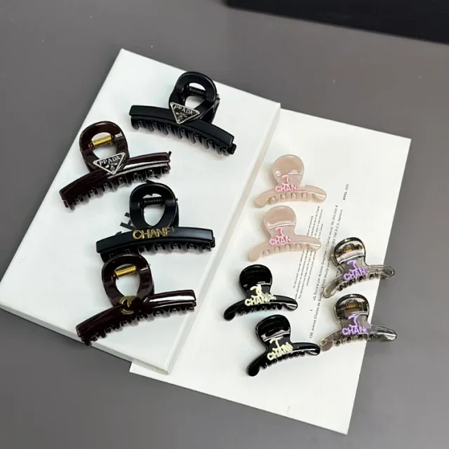 Prada Uncategorized Triangle Logo Claw Hair Clip product detail image 1