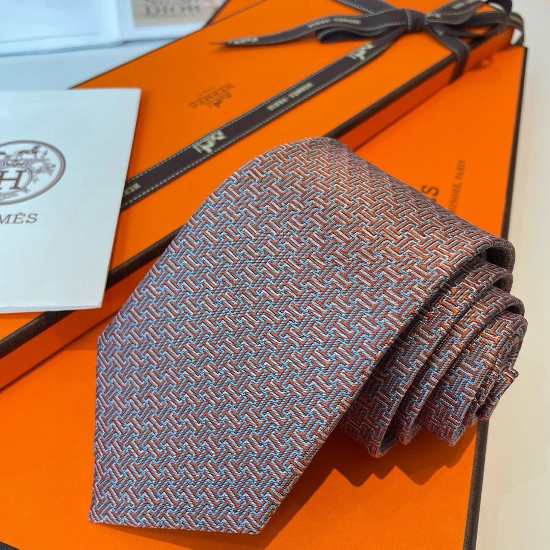 Hermès Ties Geometric H-pattern jacquard silk tie — Orange