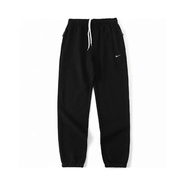 Nike Trousers Tapered sweatpants with embroidered Swoosh logo product detail image 2