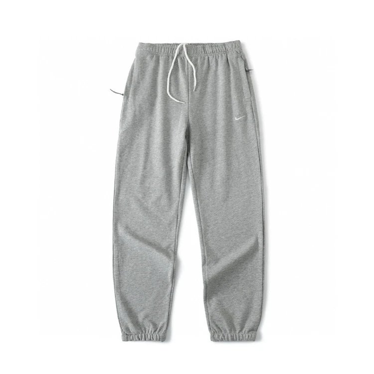Nike Trousers Tapered sweatpants with embroidered Swoosh logo — Light gray