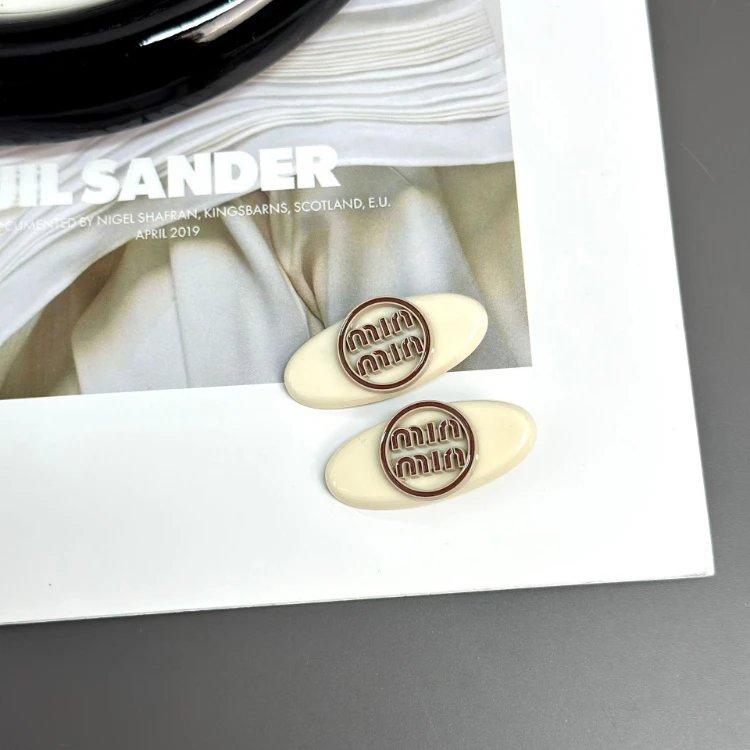 Miu Uncategorized Logo Hair Clips and Claw — SKU-03-White Double-Bolted Flange