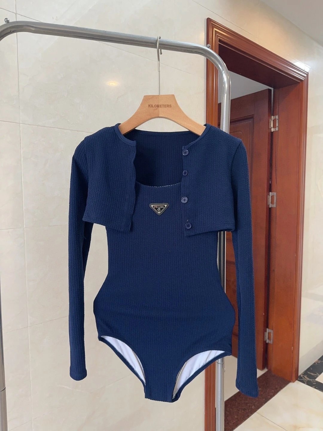 Prada Re-Nylon Ribbed Bodysuit with Detachable Cardigan Overlay | 7750158495 product reference