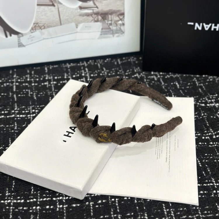 Chanel Uncategorized Braided tooth headband with CC charm — Coffee color
