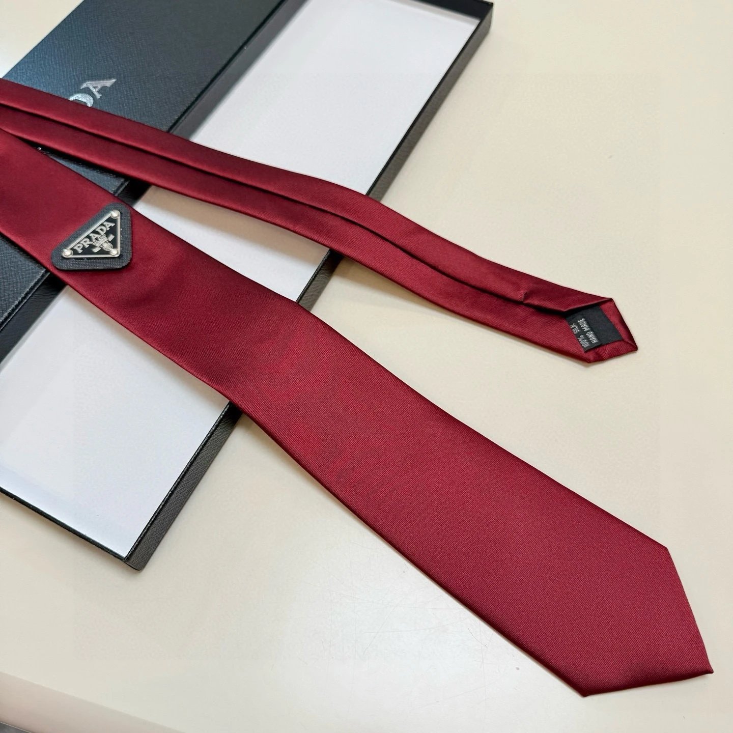 Prada Ties Silk Tie with Triangle Logo Plaque — 01