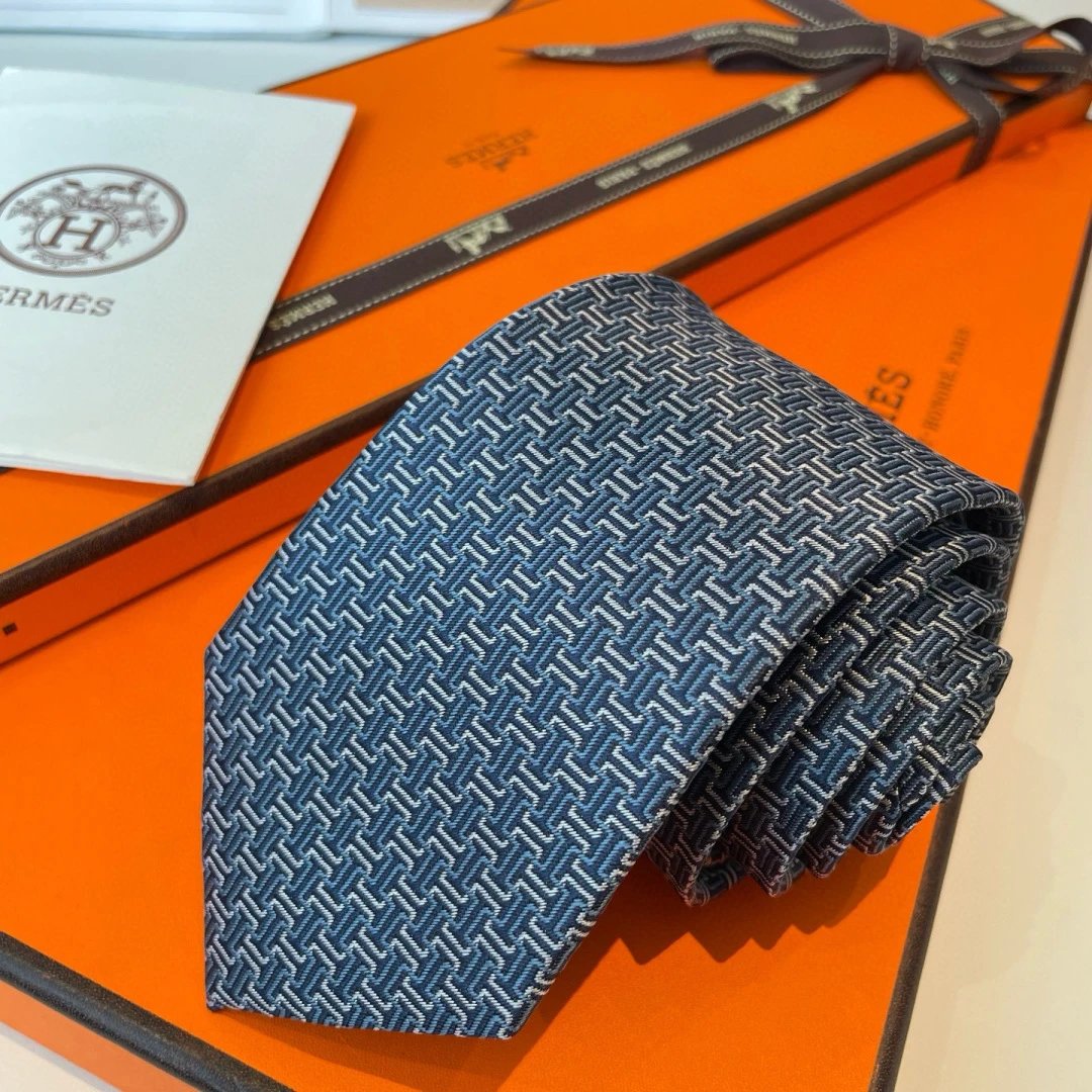 Hermès Ties Geometric H-pattern jacquard silk tie — Deep Blue
