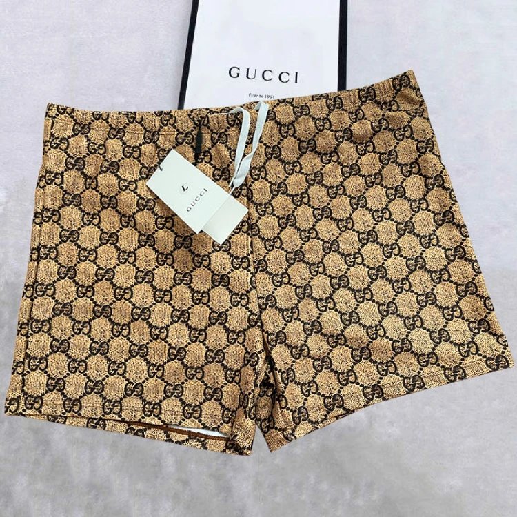 Gucci Swimwear Logo-print lined swim trunks — Linen color