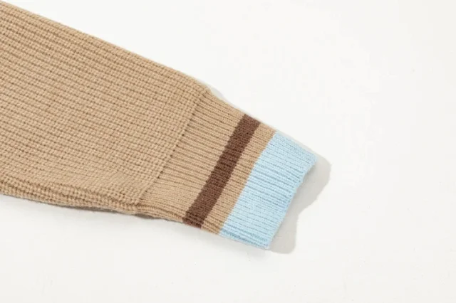 AMI Paris Knitwear V-neck knit sweater with heart applique and striped sleeves product detail image 3