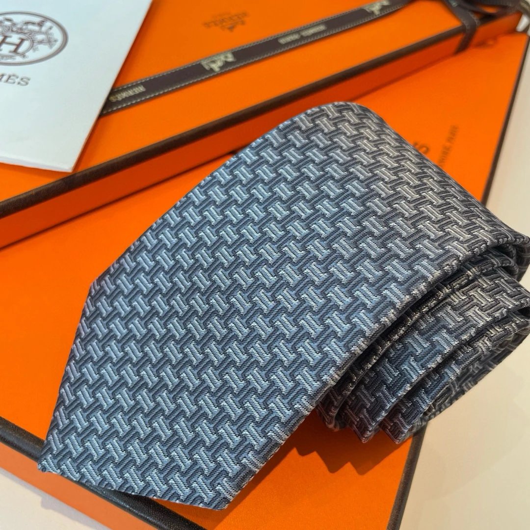 Hermès Ties Geometric H-pattern jacquard silk tie — Light blue