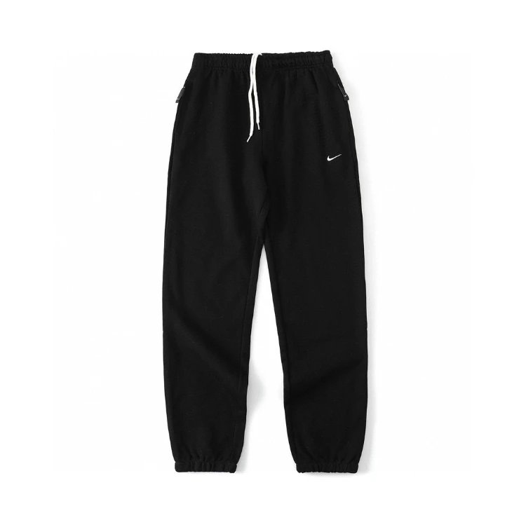 Nike Trousers Tapered sweatpants with embroidered Swoosh logo — Black