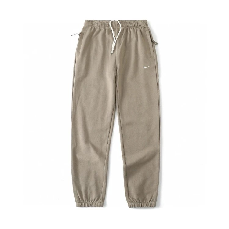 Nike Trousers Tapered sweatpants with embroidered Swoosh logo — Khaki