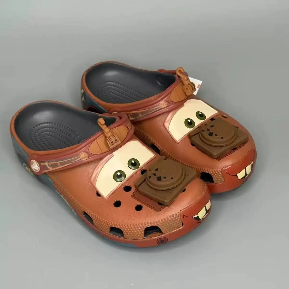 Crocs Sandals Ventilated clogs with heel straps and decorative charms — 37