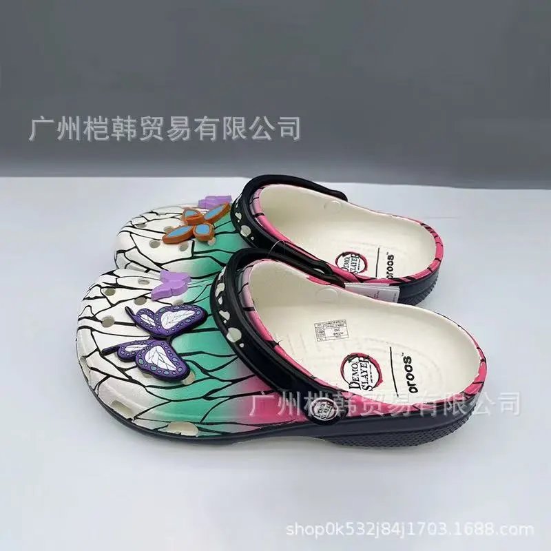 Crocs Sandals Ventilated clogs with heel straps and decorative charms — 14