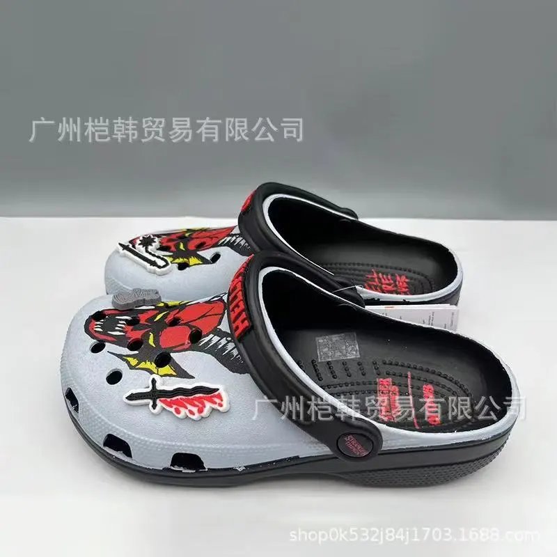 Crocs Sandals Ventilated clogs with heel straps and decorative charms — 17