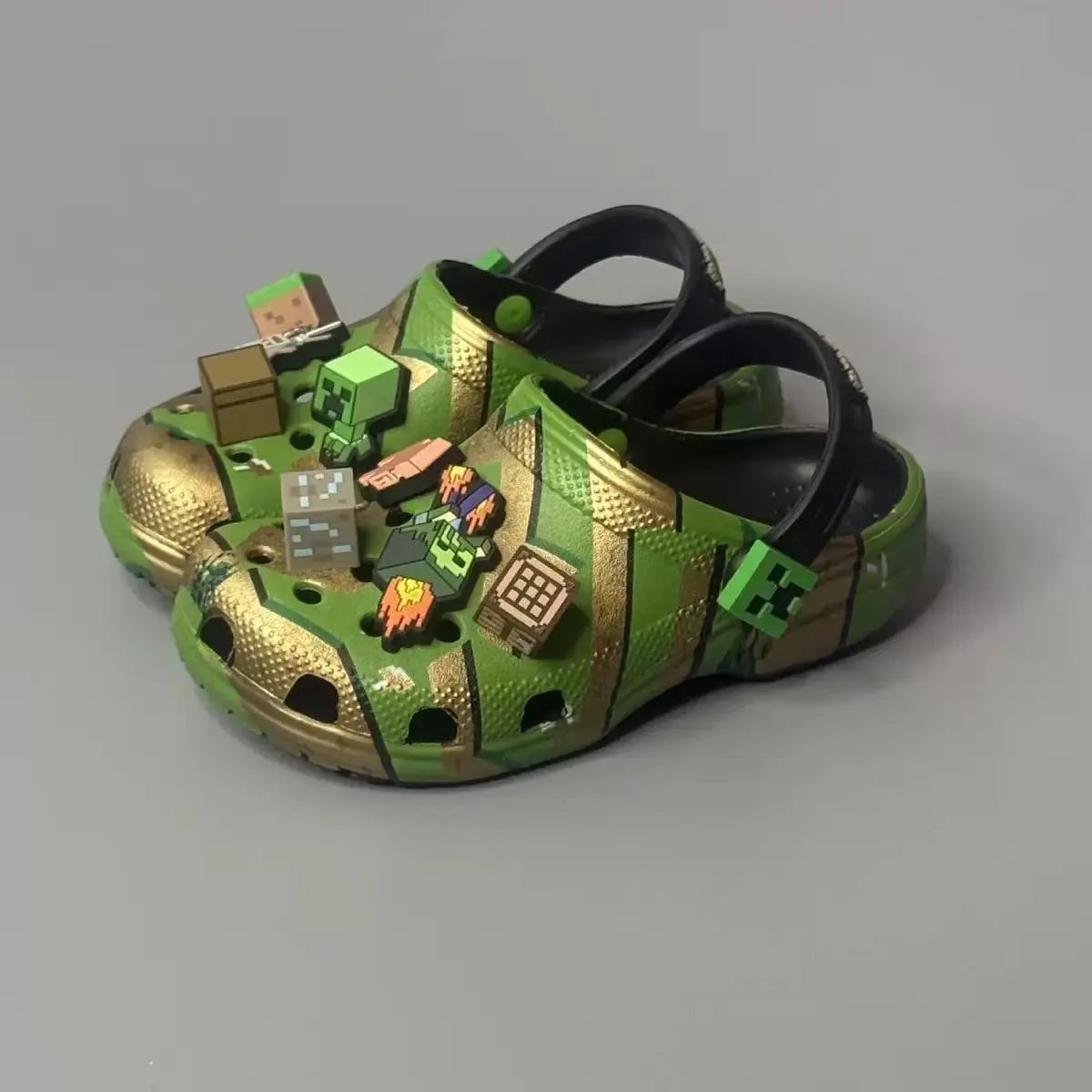 Crocs Sandals Ventilated clogs with heel straps and decorative charms — 39