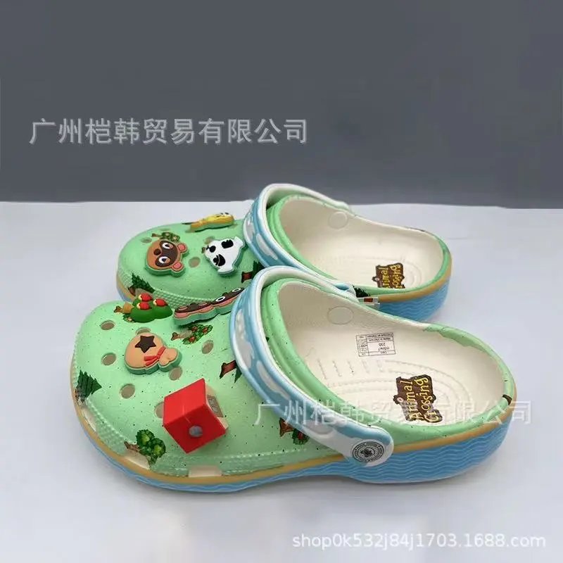 Crocs Sandals Ventilated clogs with heel straps and decorative charms — 21