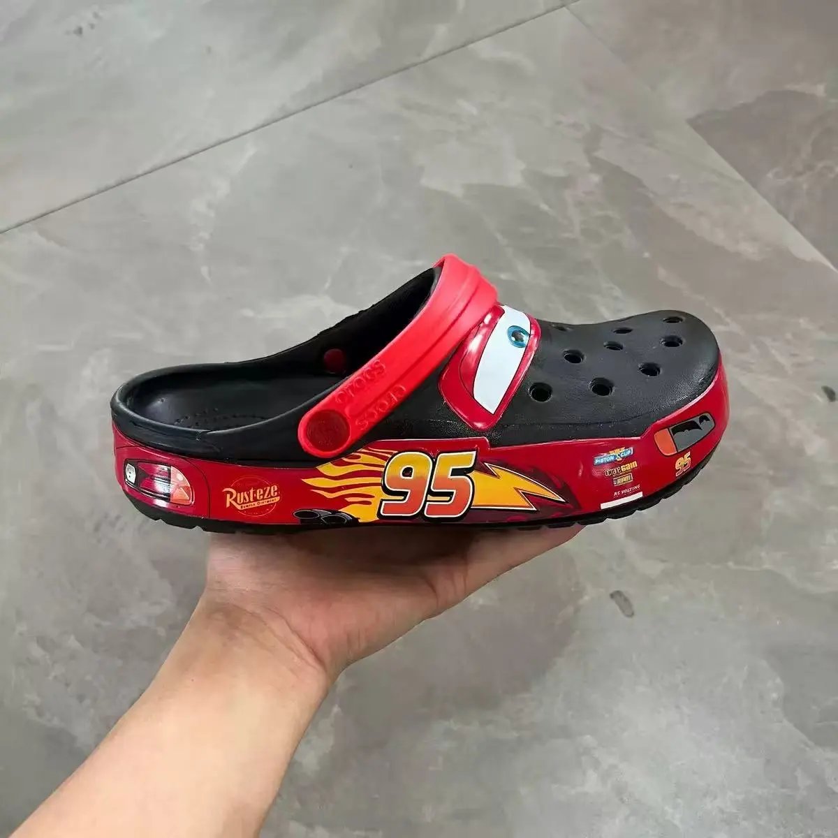 Crocs Sandals Ventilated clogs with heel straps and decorative charms — 35