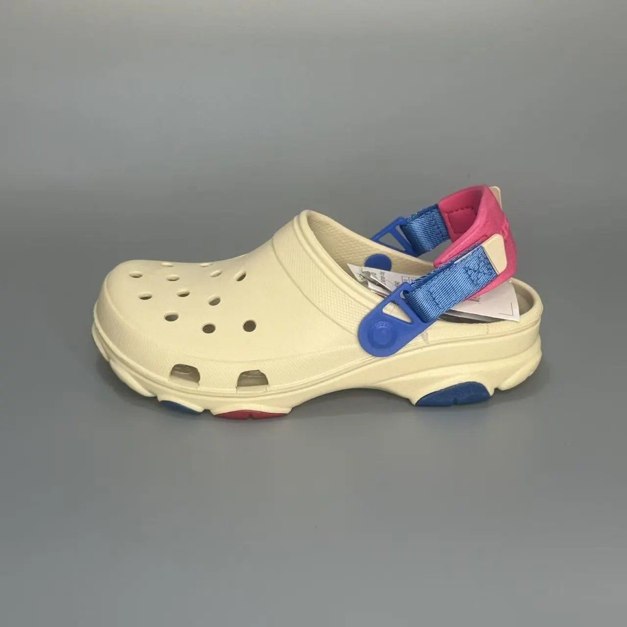 Crocs Sandals Ventilated clogs with heel straps and decorative charms — 28
