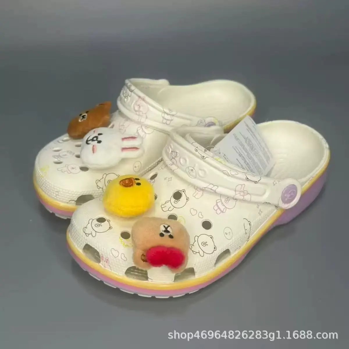 Crocs Sandals Ventilated clogs with heel straps and decorative charms — 40